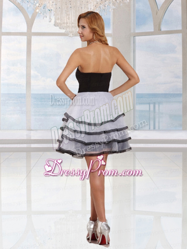Your night will be off to a spectacular start when you slip into this strapless cocktail d