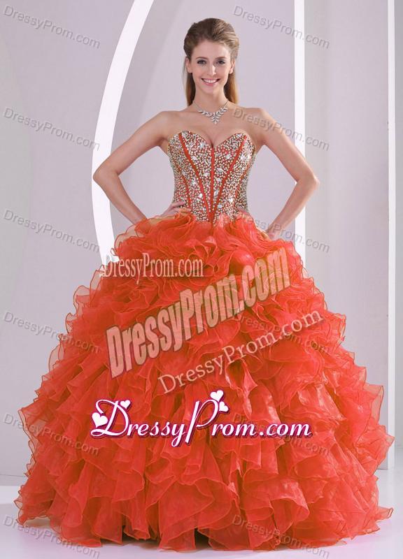 Ball Gown Sweetheart Ruffles and Beaded Decorate Coral Red Quinceanera Gowns