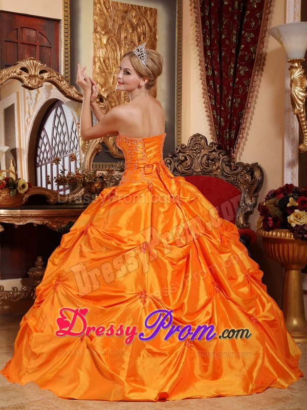 Pick-up and Beading Quinceanera Dress in Orange Strapless