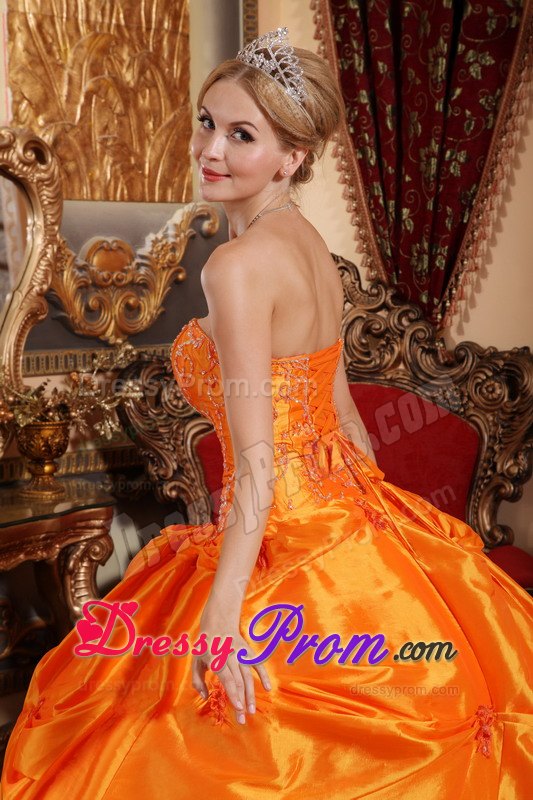 Pick-up and Beading Quinceanera Dress in Orange Strapless