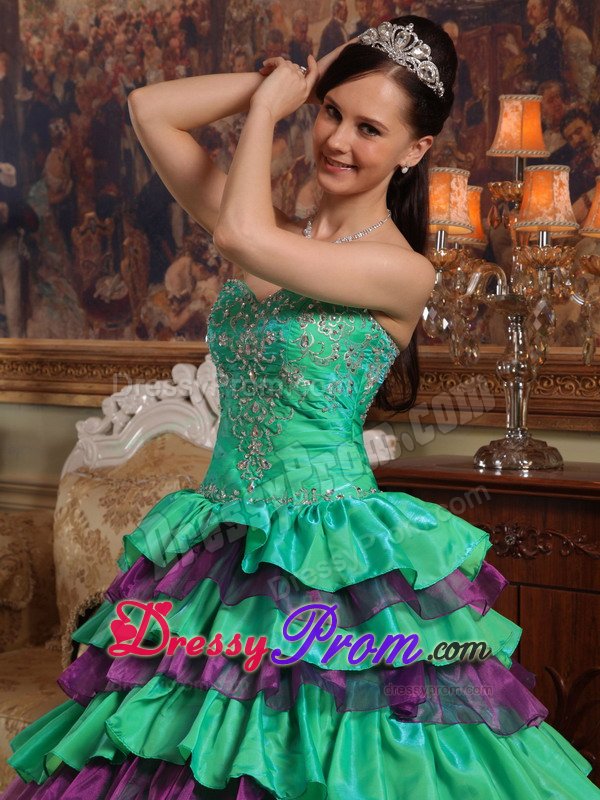 Appliqued Green and Purple Quinceanera Dress with Ruffled Layers