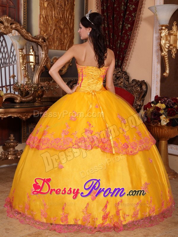 Yellow Strapless Floor Length Quinceanera Gown with Lace Appliques
