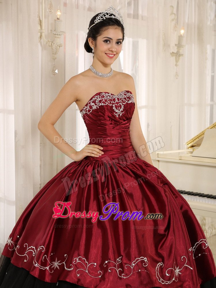 Embroidered and Ruched Quinceanera Gowns in Black and Wine Red