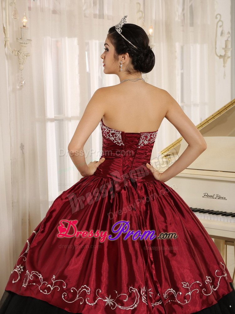 Embroidered and Ruched Quinceanera Gowns in Black and Wine Red