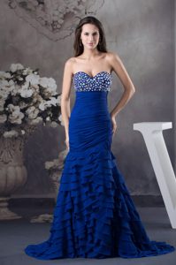 Beading and Ruffled Layers Decorate Prom Dresses in Royal Blue