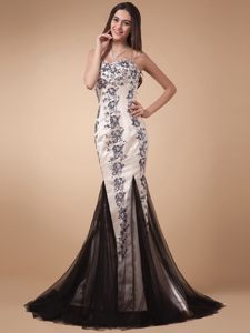 Mermaid Brush Train Champagne and Black Prom Dress With Appliques