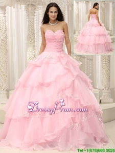 Beautiful Baby Pink Quinceanera Gowns with Beading and Ruffles