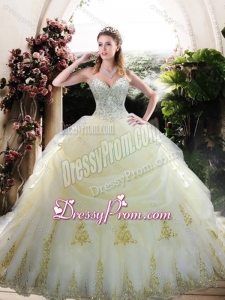 Custom Designed White Quinceanera Gown with Appliques and Beading