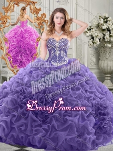 Elegant Brush Train Lavender Quinceanera Gown with Beaded Bodice and Ruffles