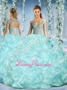 Gorgeous Cap Sleeves Beaded Light Blue Quinceanera Dress with Deep V Neck