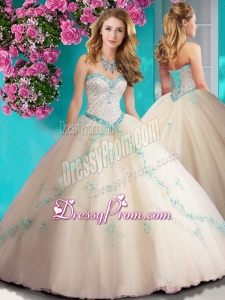 Elegant Beaded and Applique Tulle Quinceanera Dress in Champagne