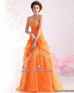2015 Unique Strapless Orange Red Prom Dress with Hand Made Flowers and Beading