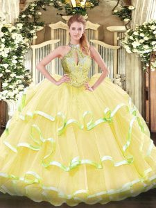Yellow Ball Gowns Halter Top Sleeveless Organza Floor Length Lace Up Beading and Ruffled Layers Sweet 16 Dress