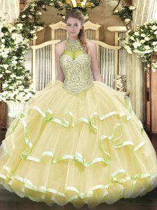 Light Yellow Ball Gowns Organza and Tulle Halter Top Sleeveless Beading and Ruffled Layers Floor Length Lace Up Quinceanera Gown