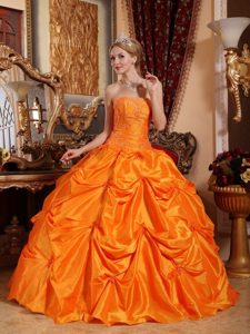 Pick-up and Beading Quinceanera Dress in Orange Strapless