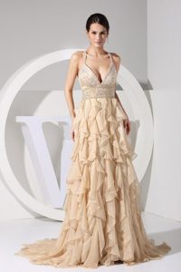 Beaded and Ruffled Champagne Dress for Prom Queen with Criss Cross