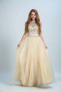 Deluxe Champagne Sleeveless Beading Floor Length Prom Gown