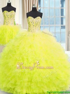 Deluxe Yellow Sleeveless Floor Length Beading and Ruffles Lace Up Quince Ball Gowns